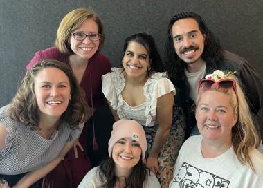 A group of people posing for a photo.