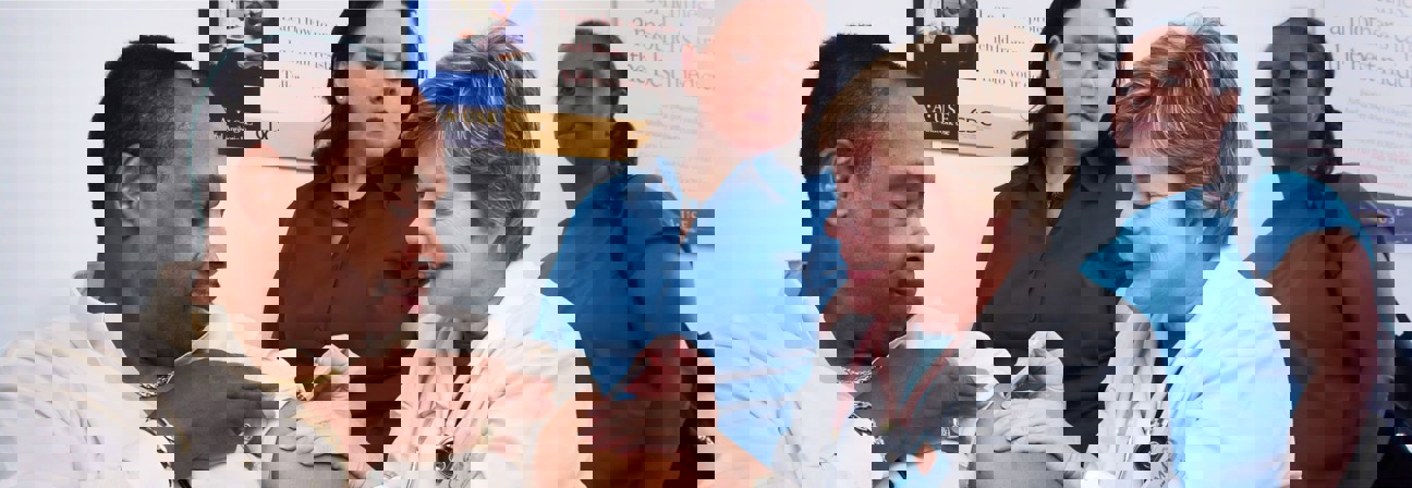 A group of people in a room.