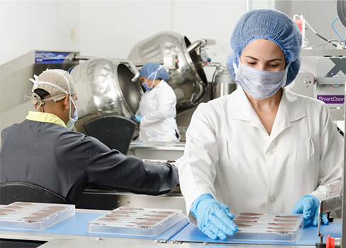 A group of people in a room.