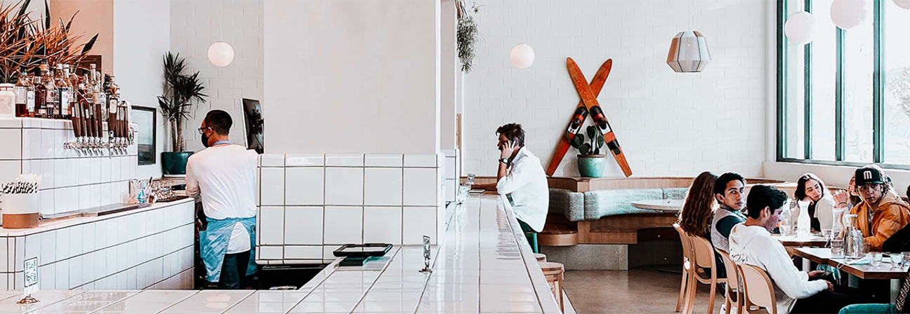 A group of people sitting at a table.
