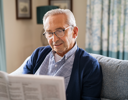 A man sitting on a couch.