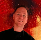 A person smiling for the camera.