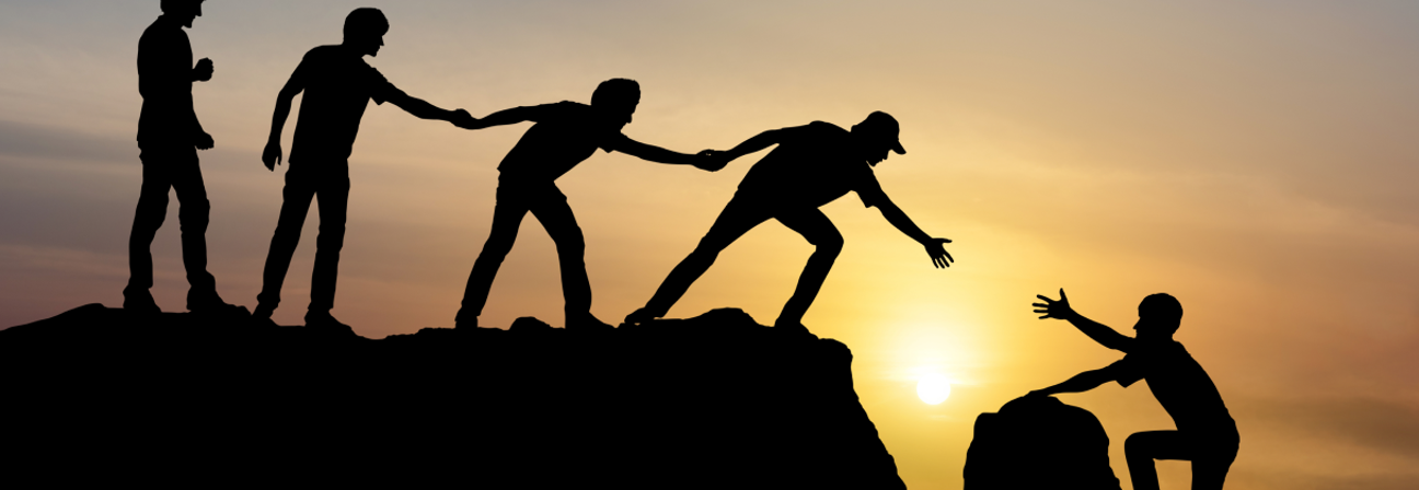 A group of people jumping.