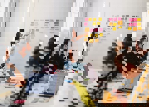 A group of people in a meeting.