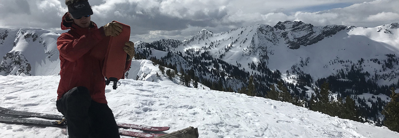 A man on a snowboard.