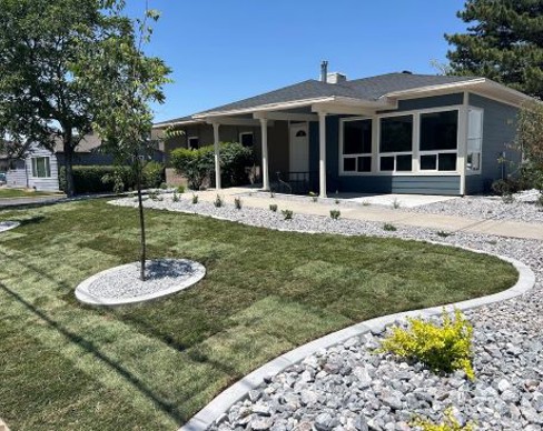 A house with a large front yard.