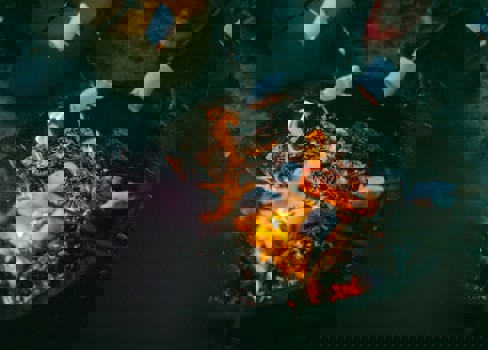 A fire burning on a table.